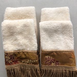 4 ivory with gold tassel fingertip Croscill towels